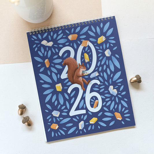 Med knjigami - Stenski koledar 2026