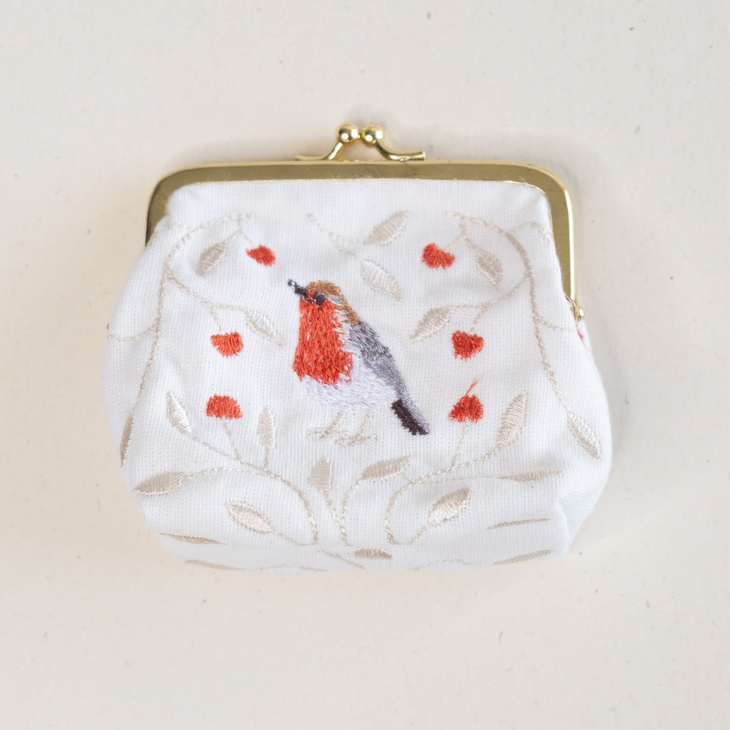 Torbica z izvezenim motivom taščice