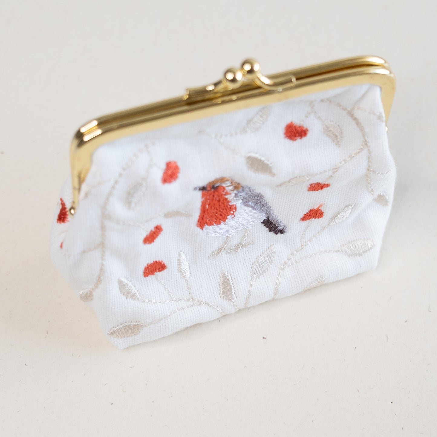 Torbica z izvezenim motivom taščice