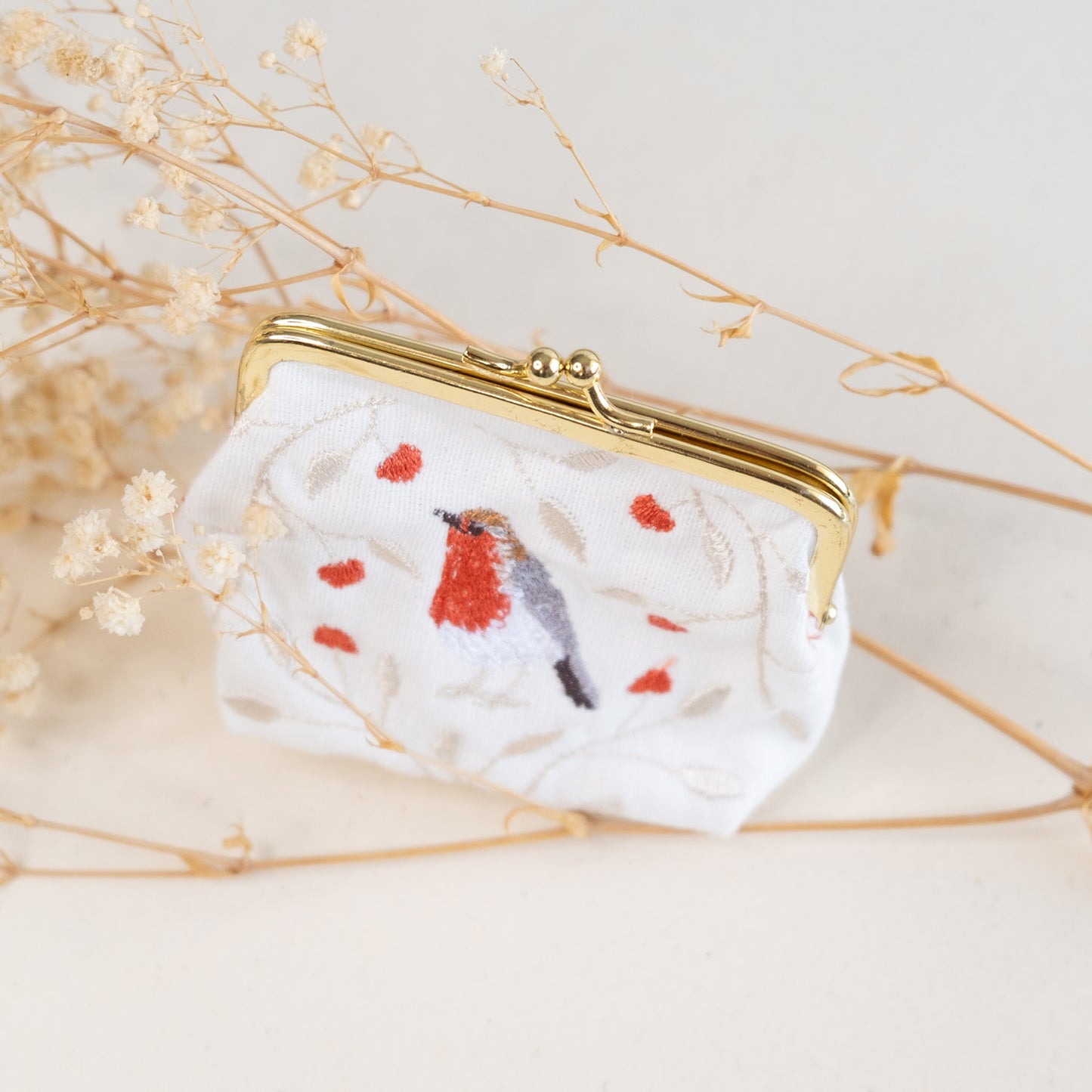 Torbica z izvezenim motivom taščice